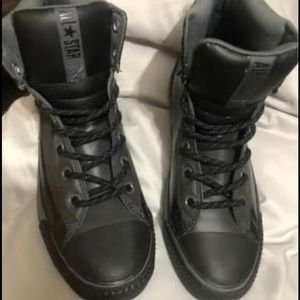 Black leather hightop shoes